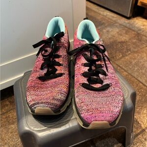 Nike Flyknit Air in Pink and Black